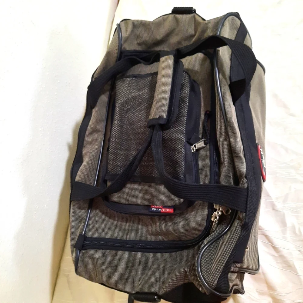 Calpak rolling duffel bag